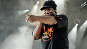 KRS-One, a pioneering hip-hop artist, performs "The Bridge Is Over," an influential diss track that shaped the genre's history