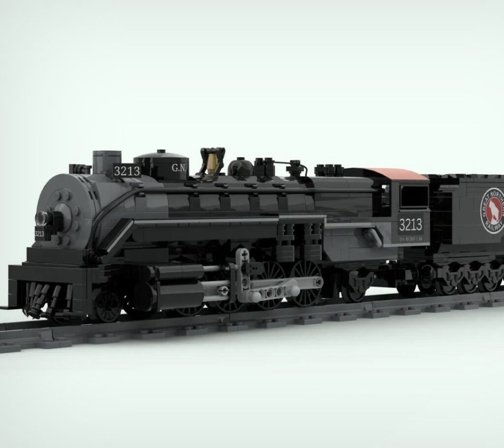 A detailed LEGO model of a Mikado steam locomotive, showcasing intricate design and historical accuracy with 1,195 pieces.