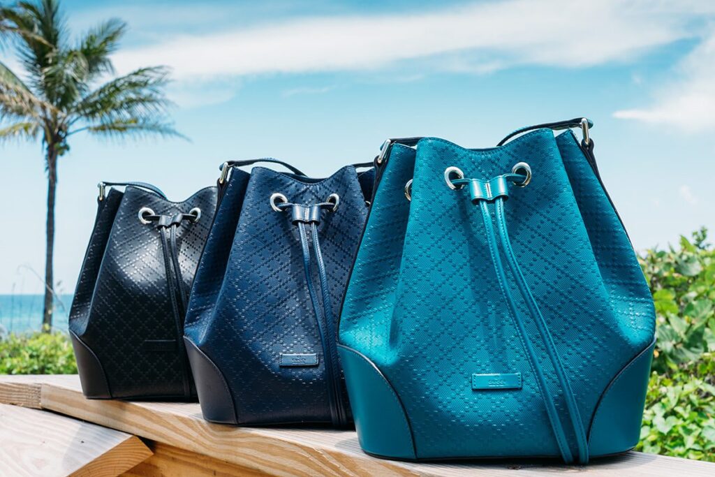 A Gucci Bright Diamante handbag showcasing the iconic 1930s diamond pattern reimagined in vibrant colors and premium leather