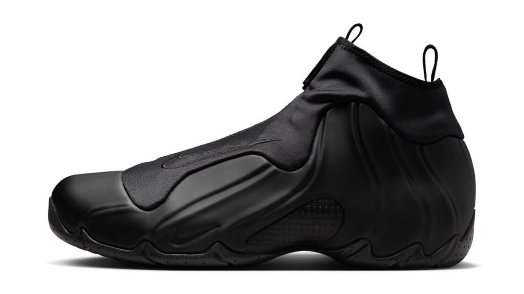 The Nike Air Flightposite Triple Black 2025, a futuristic all-black sneaker with Foamposite tech and a zippered shroud design