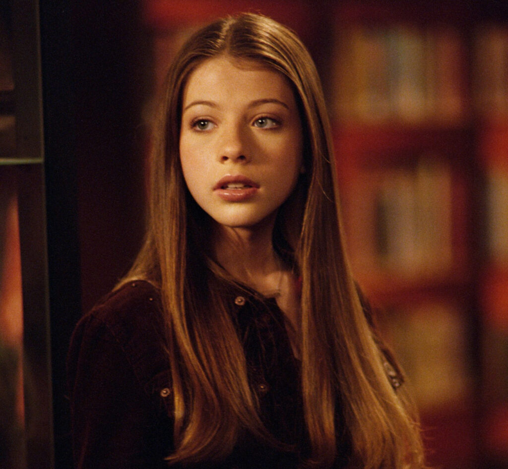 Michelle Trachtenberg in iconic roles from Buffy the Vampire Slayer and Gossip Girl, showcasing her Hollywood career