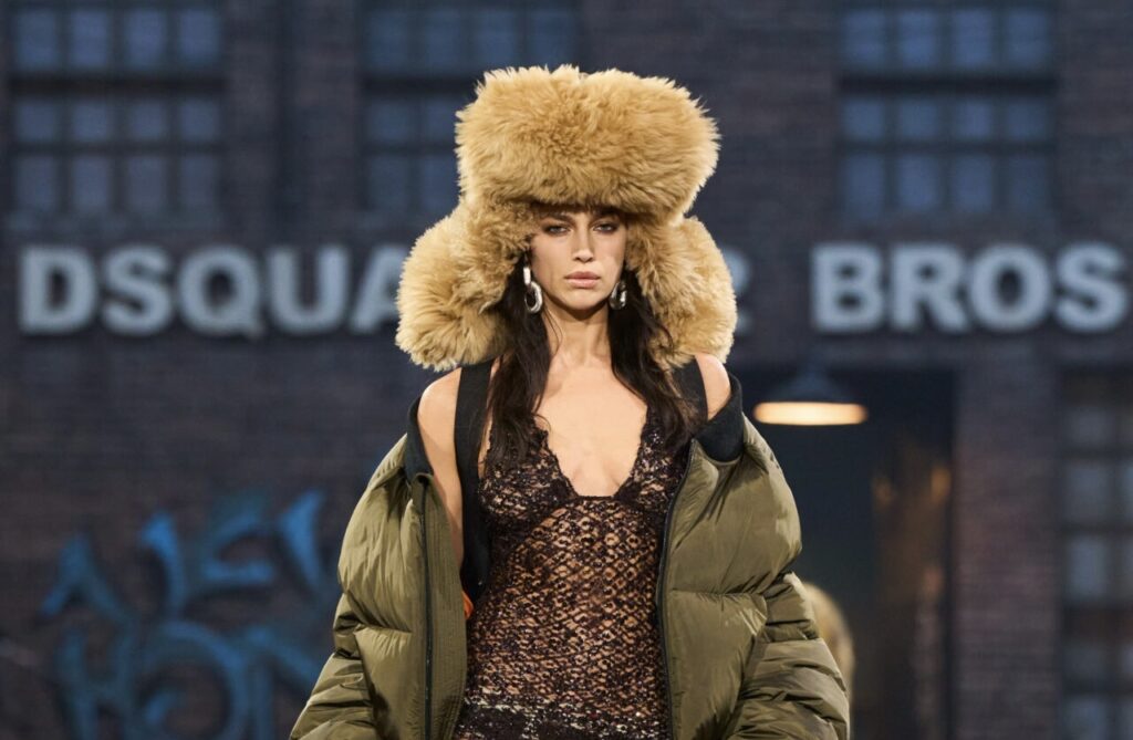Naomi Campbell struts the Dsquared2 30th Anniversary runway in a striking leather ensemble, embodying power and rebellion