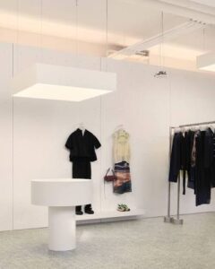 SUNNEI's groundbreaking concept store in Milan, featuring a blend of fashion, art, café, and gallery, provides an innovative and immersive retail experience for visitors