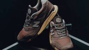 Stone Island x New Balance NB998 sneaker featuring Raso Gommato-inspired upper, reflective accents, and ABZORB cushioning