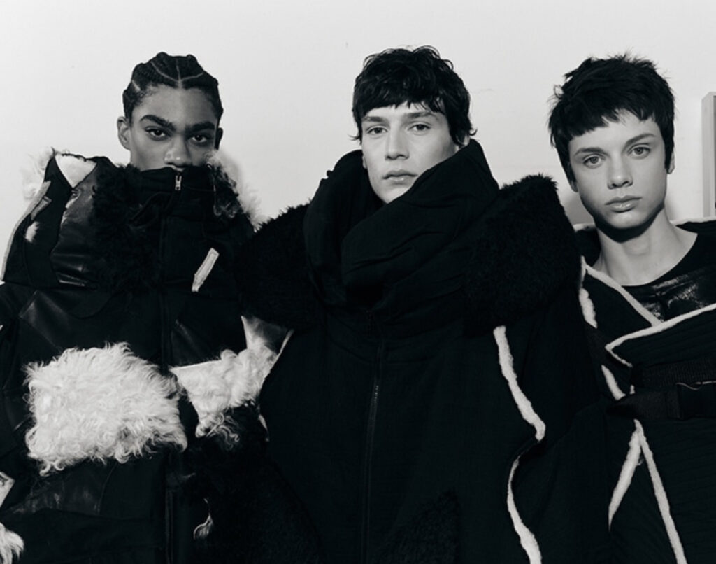 Group photo of SANGUE NOVO designers at ModaLisboa, showcasing their cutting-edge collections and celebrating their achievements