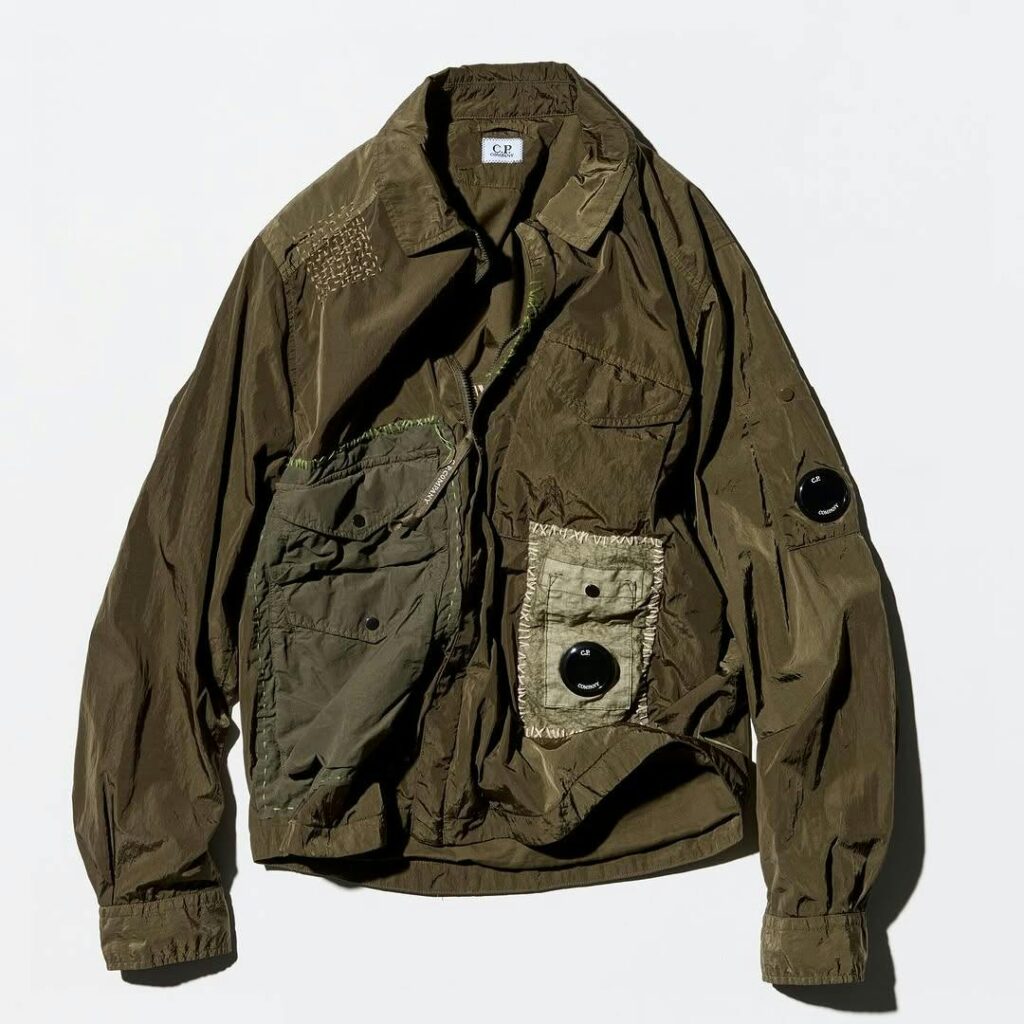 Sashiko Gals artisans meticulously hand-stitching custom embroidery on C.P. Company's nylon jackets, showcasing traditional sashiko techniques