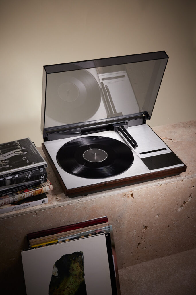 A sleek, high-end turntable created by Saint Laurent Rive Droite and Bang & Olufsen, featuring a minimalist design and modern upgrades for unparalleled audio quality