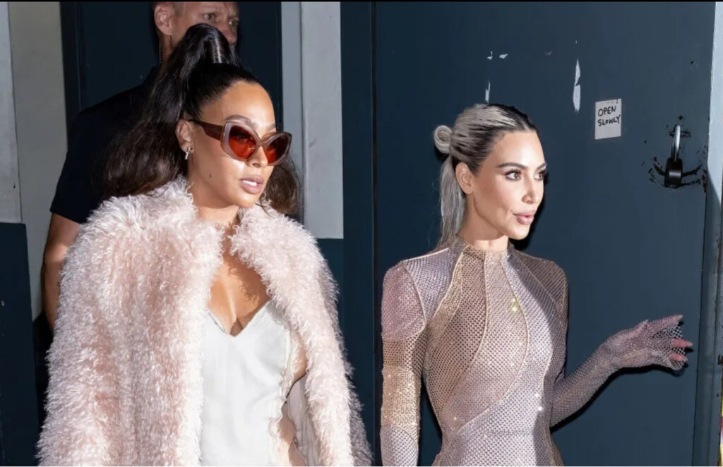 La La Anthony and Kim Kardashian pose together promoting Hulu’s upcoming satirical series Group Chat