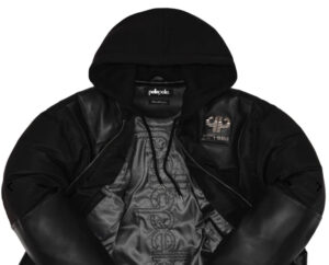 Close-up of a Pelle Pelle Dogbiter Jacket featuring heavy leather, metal studs, and bold streetwear detailing