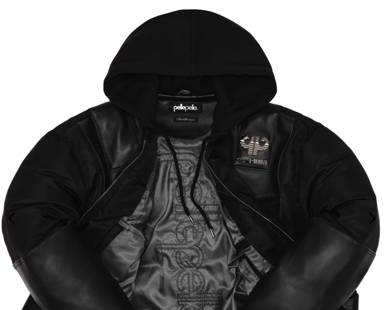 Close-up of a Pelle Pelle Dogbiter Jacket featuring heavy leather, metal studs, and bold streetwear detailing