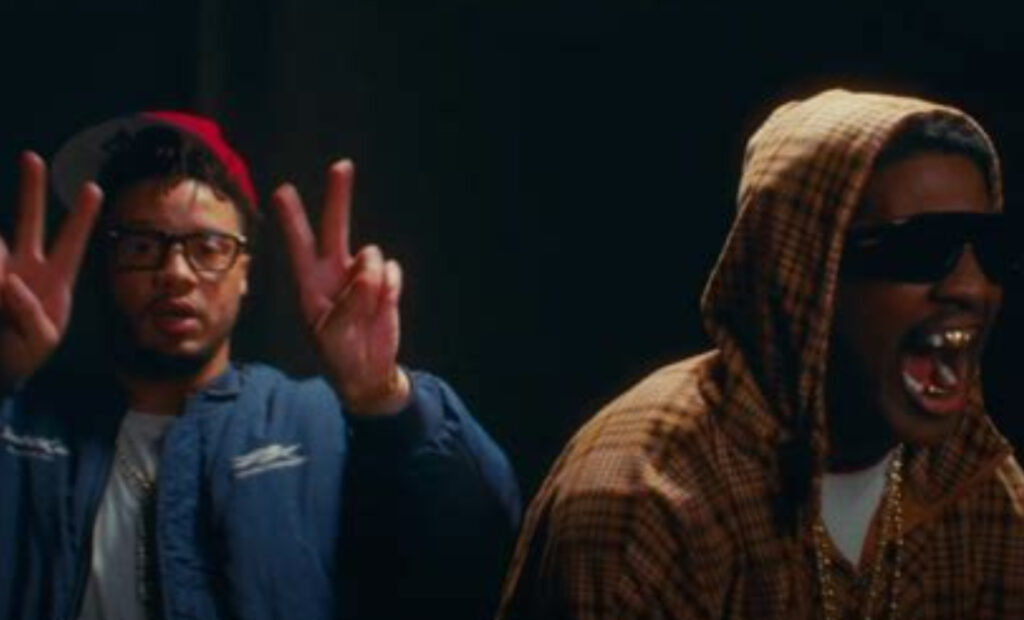 Lil Yachty and Veeze in the “Can’t Be Crete Boy” music video, shot by Lyrical Lemonade, walking through a high school hallway