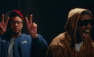 Lil Yachty and Veeze in the “Can’t Be Crete Boy” music video, shot by Lyrical Lemonade, walking through a high school hallway