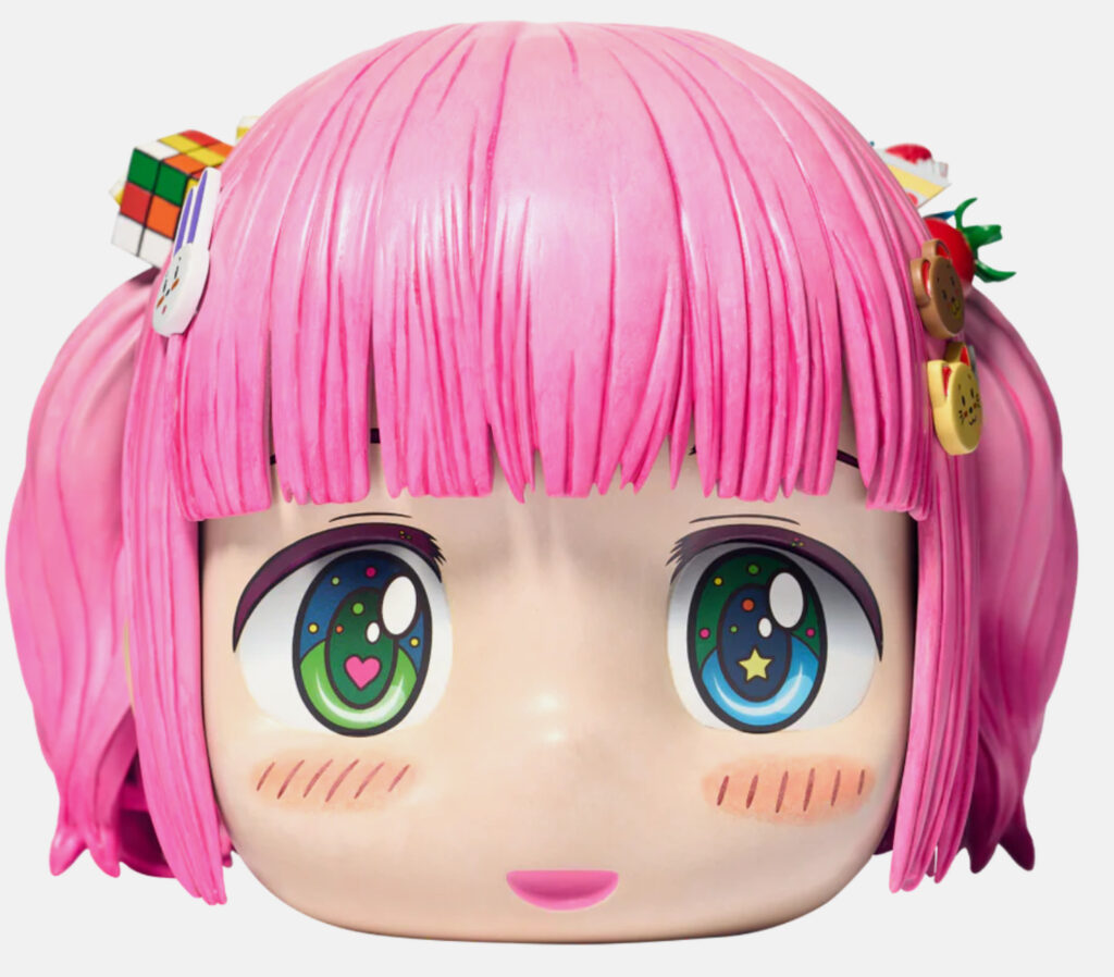 Close-up of the Hikari Head Collectible in “Pink” by Japanese artist Mr., featuring signature hair accessories and stylized vinyl finish