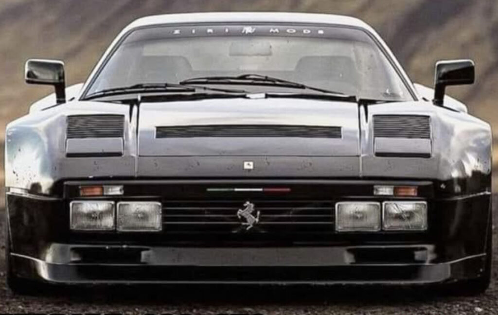 Ferrari 288 GTO in black, highlighting its wide stance, flared arches, and aggressive styling