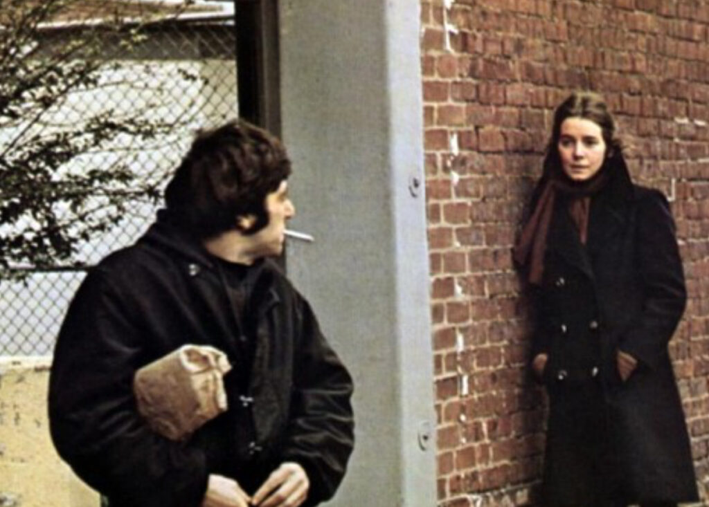 Al Pacino and Kitty Winn in a still from Panic in Needle Park (1971), sitting on a bench in Sherman Square, NYC