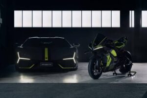 Ducati Panigale V4 Lamborghini Speciale Clienti motorcycle in lime green with carbon fiber detailing, displayed in showroom