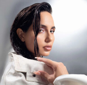 Catalina Cara photographed in soft natural light, representing the introspective tone of her single “Shinon.”