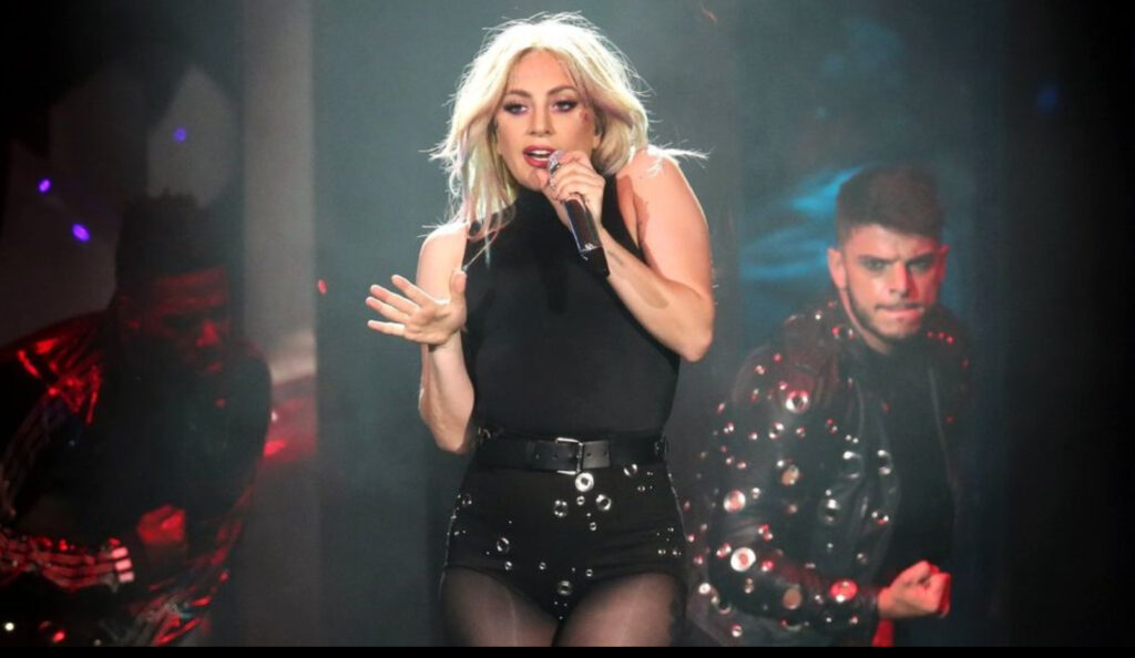 Lady Gaga and Gesaffelstein perform “Killah” live at Coachella 2025 on a chrome-lit stage with industrial visuals