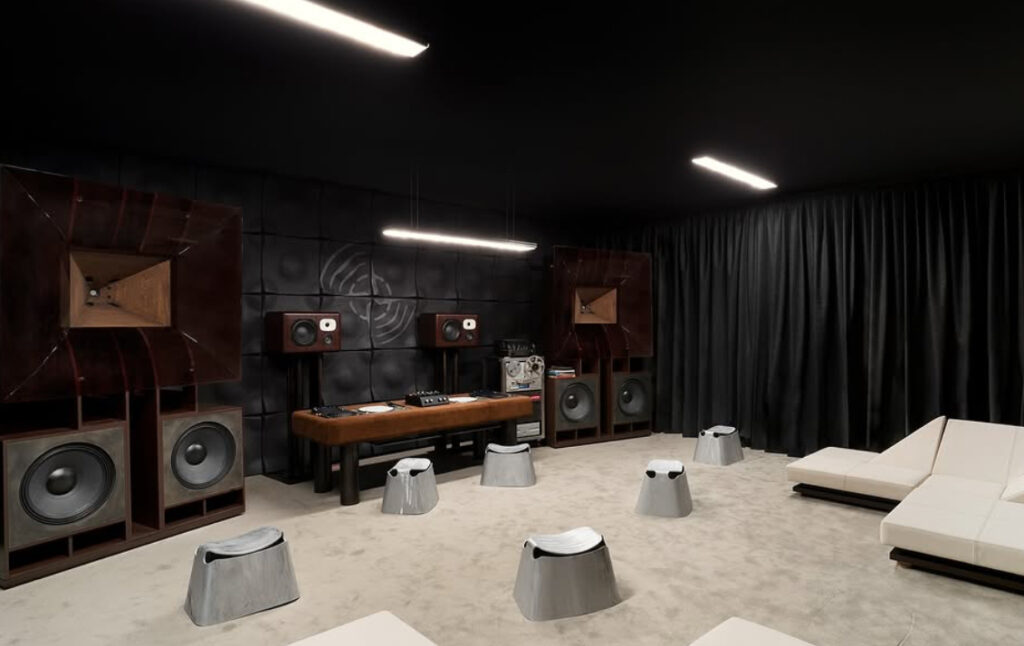 Custom Friendly Pressure speakers inside a Stone Island installation at Capsule Plaza, blending fashion design with immersive sound