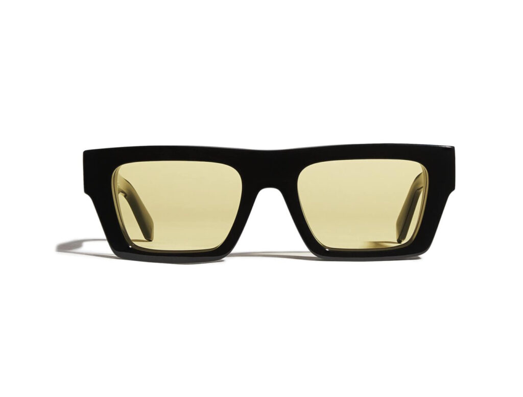 Off-White sunglasses featuring bold acetate frames, “SUNGLASSES” text, and signature arrow logo detailing on temple