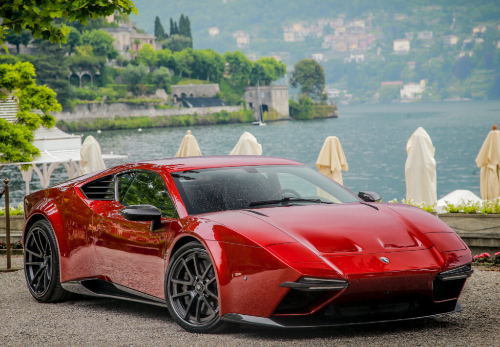 ARES Panther ProgettoUno driving on an alpine road at sunset