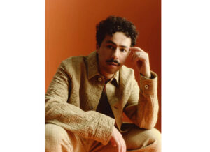 Ramy Youssef in Brooklyn wearing a Ferragamo outfit, discussing his new animated series and Arab American identity in 2025