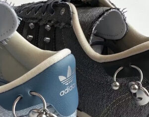 Denim-wrapped adidas Taekwondo shoes from the “Punk Ballet” pack featuring metal piercings and slim profile design