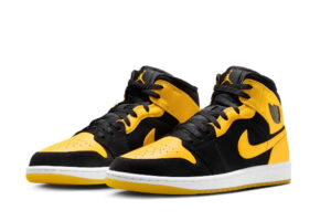 Air Jordan 1 Mid ‘New Love’ shoe in black and yellow, photographed on a clean background with visible detailing