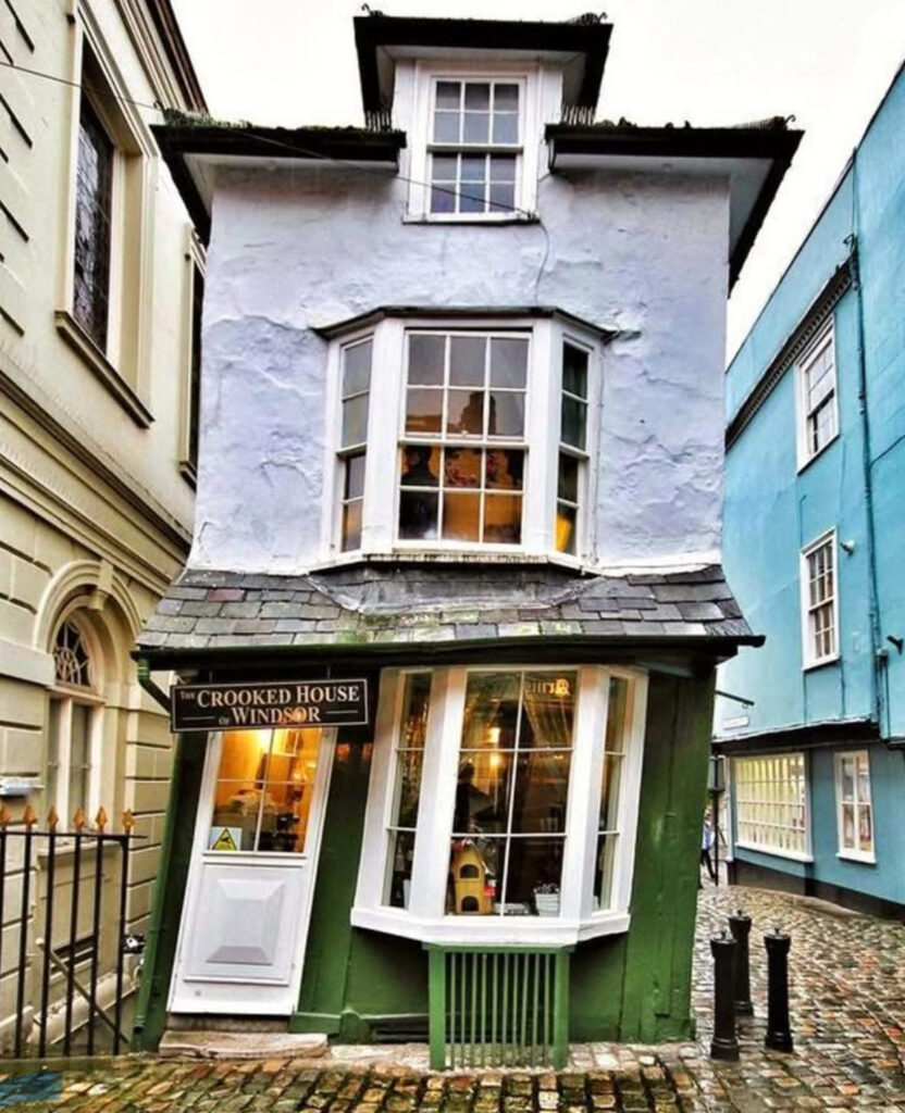 Exterior of The Crooked House in Lavenham, a leaning timber-framed building from 1687 and England’s oldest teahouse