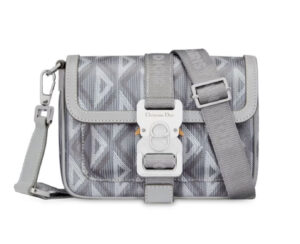 Dior Hit the Road Mini Bag in black calfskin with front flap pocket and aluminum buckle detailing