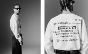 Rhude x Pirelli racing jacket with motorsport patches on asphalt backdrop