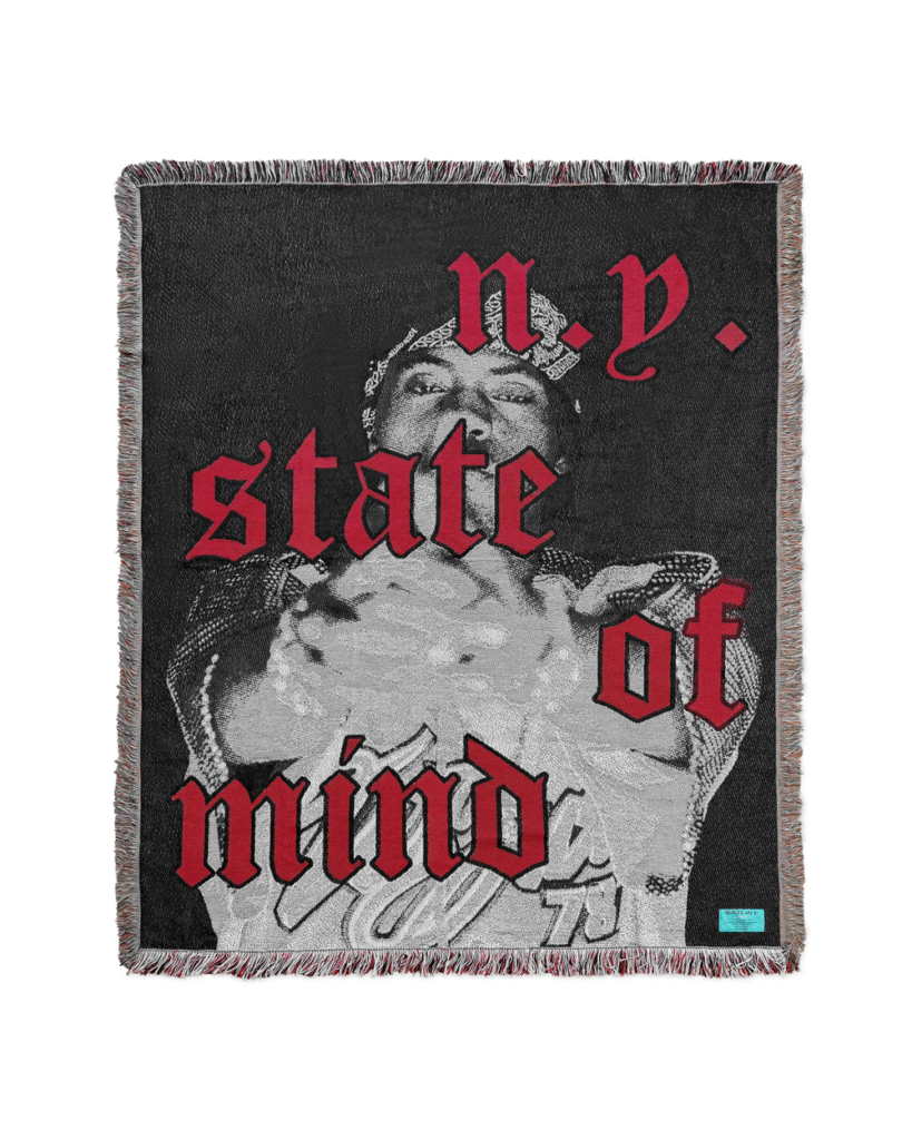 Black and cream jacquard blanket with architectural motifs, inspired by Nas’s “NY State of Mind”