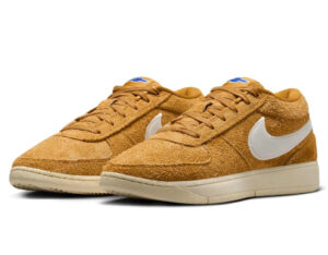 Nike x Chevrolet Book 1 “Gold Leaf” shoe with golden upper, black detailing, and chrome-inspired accents on a basketball court