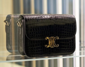 Exhibition view of CELINE MAKI-E at the Osaka-Kansai 2025 World Expo, featuring Triomphe bags and Japanese urushi lacquerware