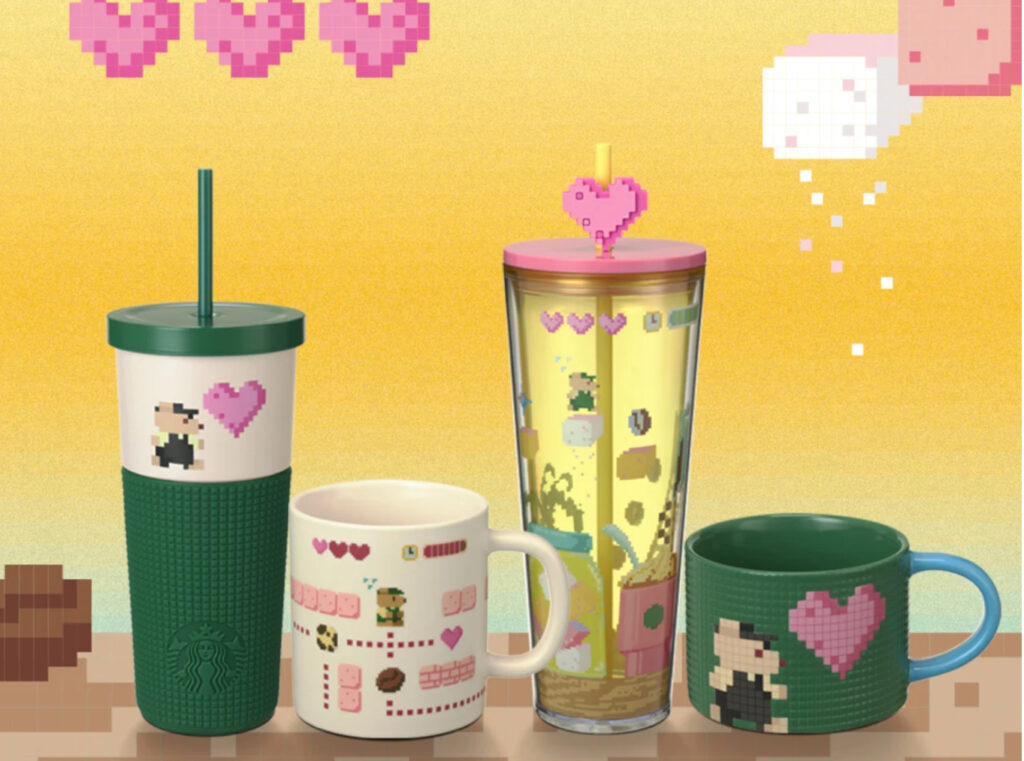 Starbucks Bearista Game Collection tumbler featuring 8-bit pixel art of Bearista mascot in a retro video game scene