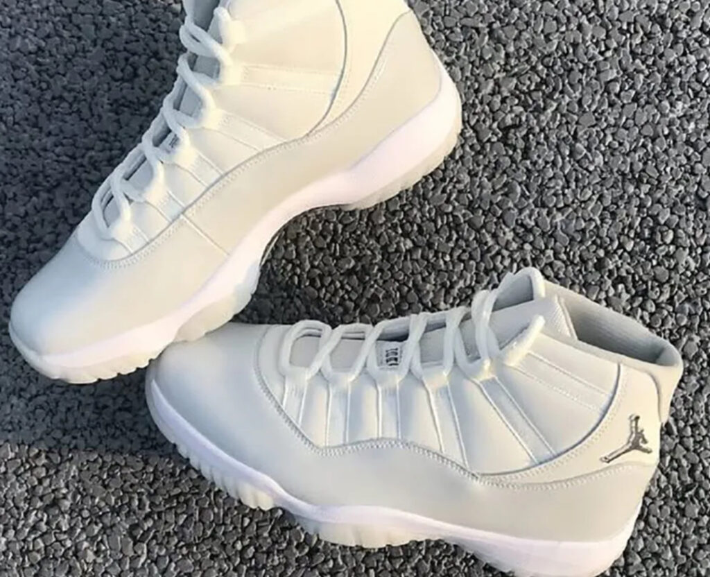 Air Jordan 11 “Sail” shoe featuring a sail mesh upper, pearl grey patent leather, and metallic silver Jumpman logo