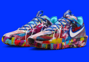 Jewell Loyd Nike GT Cut 3 Paint Splatter shoe featuring multicolor abstract pattern and white midsole