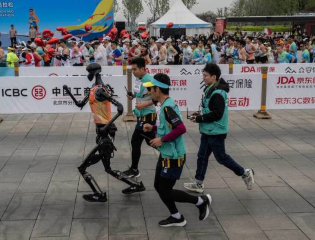 A humanoid robot jogging in a crowded urban environment during the Beijing half-marathon