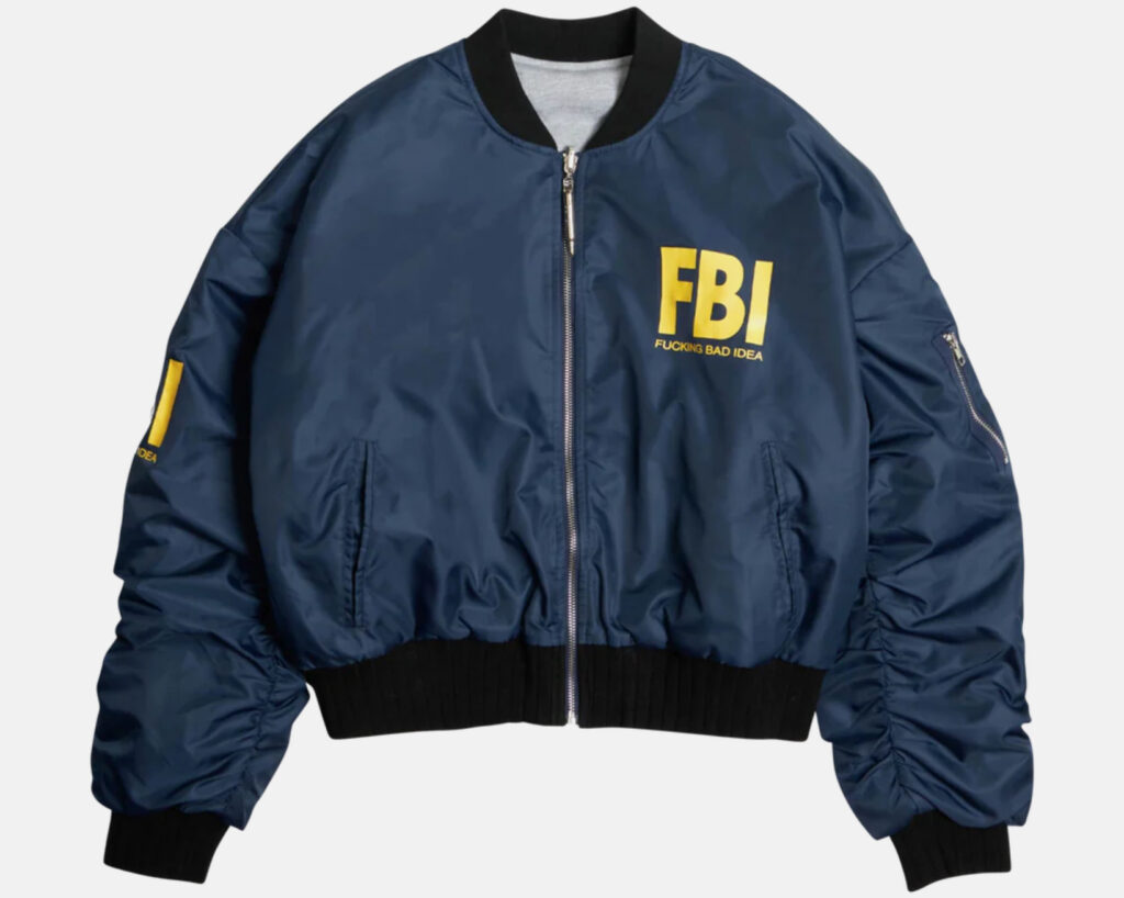 Front and back views of the OUTLW Reversible FBI/ARMY Bomber showing bold lettering, tactical detailing, and dual colorways