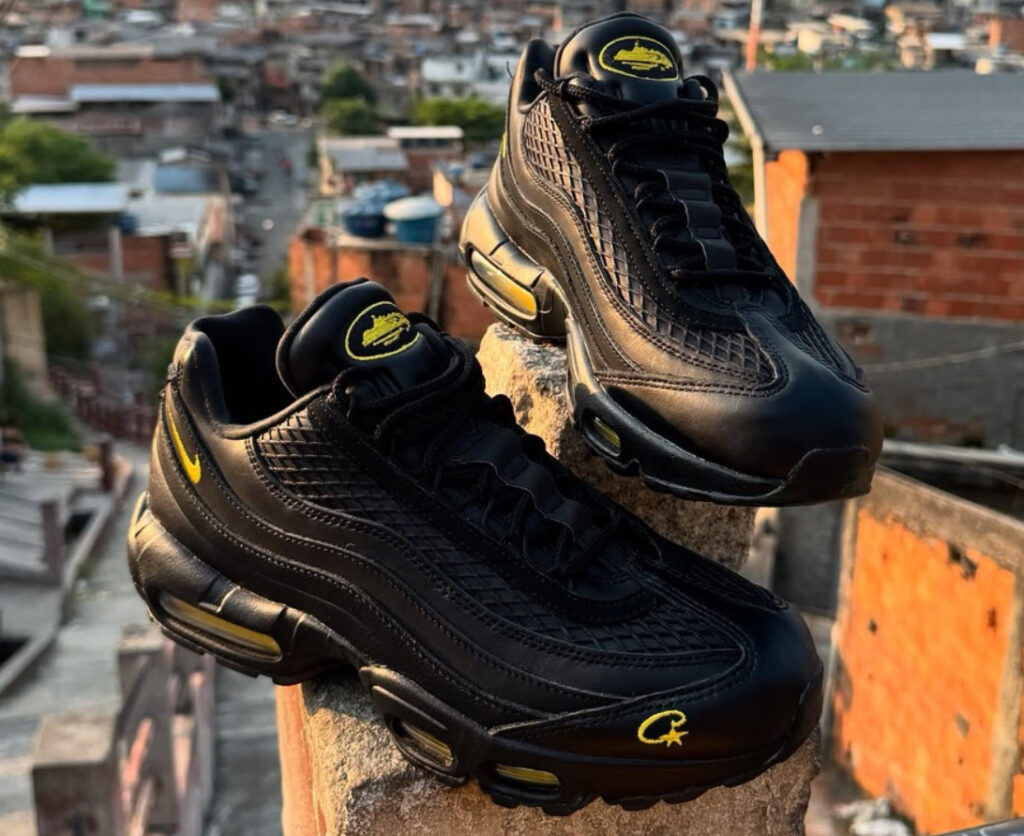 Corteiz x Nike Air Max 95 “Honey Blacks” shoe featuring black leather and yellow accents