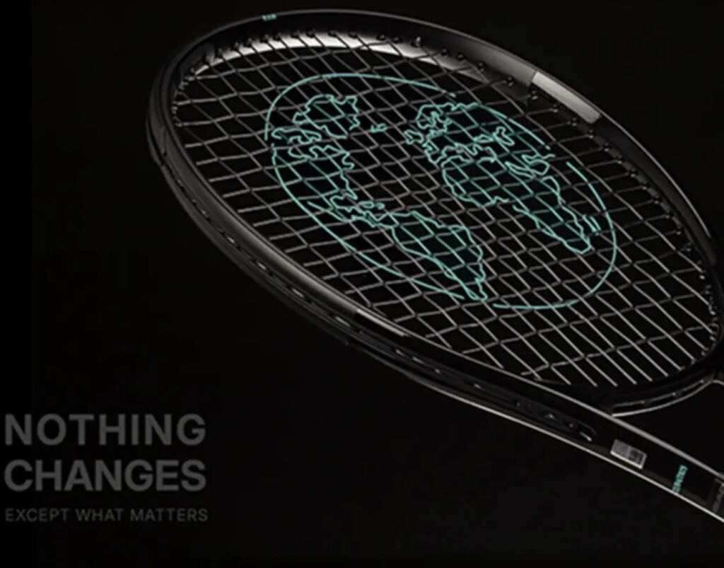 The HEAD Boom Raw tennis racket, featuring an exposed carbon fiber frame with no paint or coatings, released Earth Day 2025