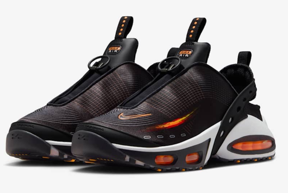 Nike Women’s Air Max in Black and Bright Citrus featuring a glowing orange Air unit, black mesh upper, and citrus accents