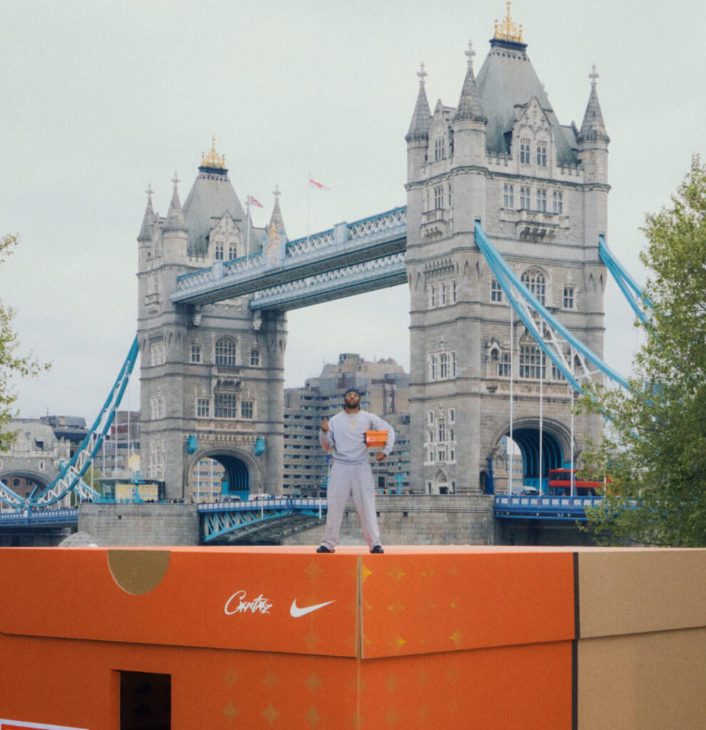 Massive Corteiz Nike Air Max 95 Honey Black shoebox pop-up structure surrounded by crowds in South East London park