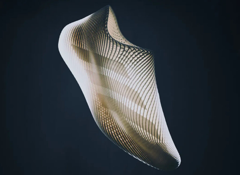 adidas Climacool 2025 shoe featuring a minimalist 3D-printed lattice upper and sleek slip-on silhouette in concrete setting