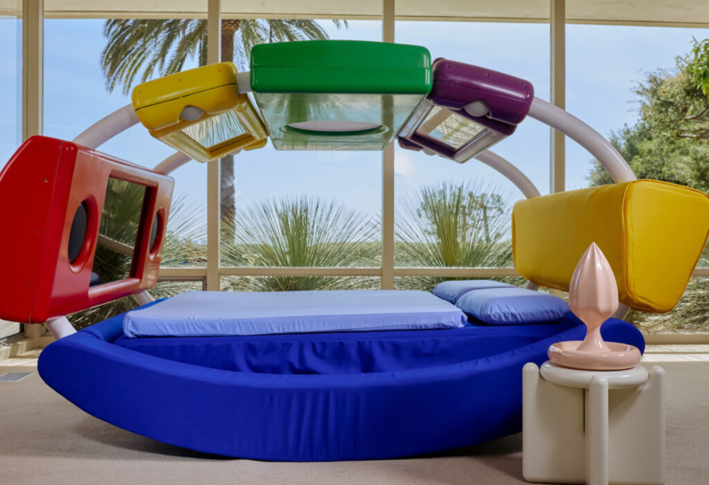 Minimalist sculptural bed by Gustaf Westman in a pastel-toned room, designed for intimacy and shared connection