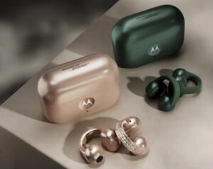 Close-up of Motorola Moto Buds Loop earbuds with Swarovski crystals, styled as jewelry on a model’s ear