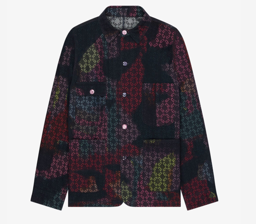 Givenchy multicolor denim mono jacket displayed on a mannequin, featuring bold color panels and sharp tailoring