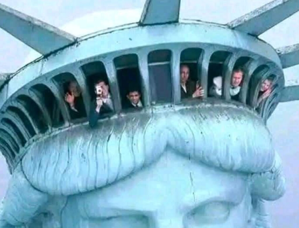 Visitors climbing the narrow spiral staircase inside the Statue of Liberty toward the crown during the 1980s