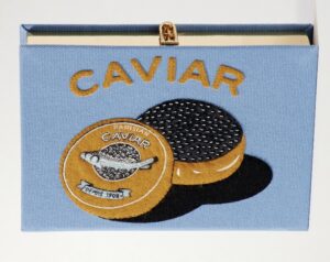 Handmade Olympia Le-Tan Caviar Clutch featuring intricate embroidery and appliqué on cream-colored canvas