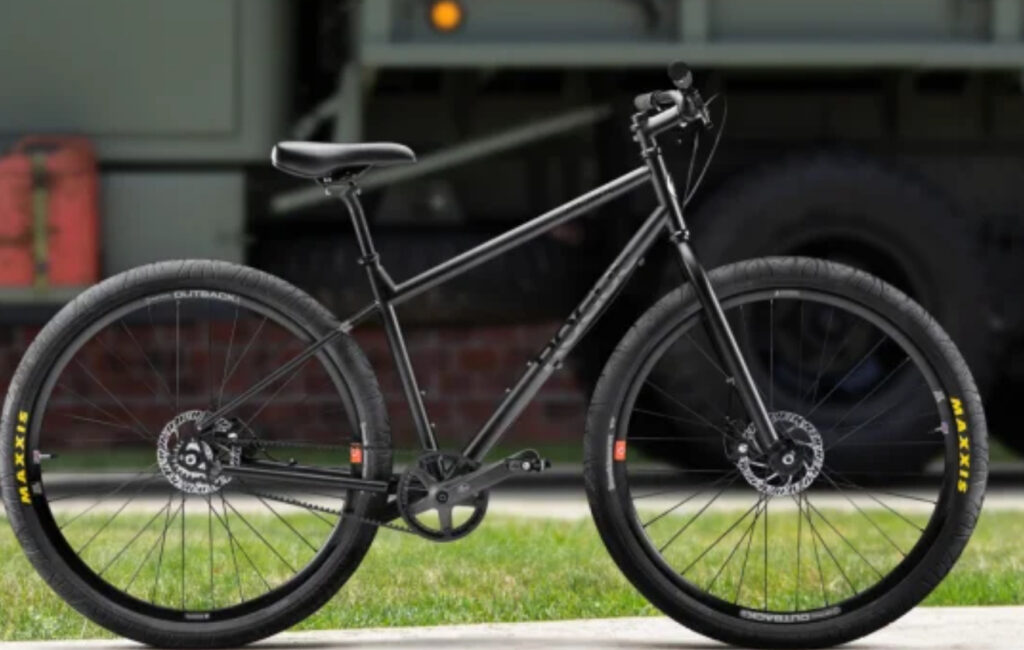 Handcrafted Stinner Milo Commuter bicycle featuring belt drive system, custom steel frame, and minimalist urban design
